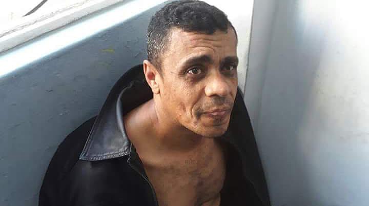 Adelio Bispo de Oliveira, ao ser detido pela polícia, logo após o atentado